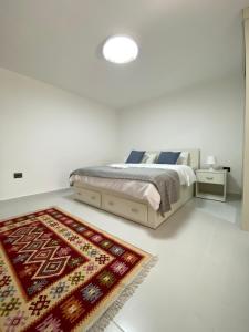 Ein Bett oder Betten in einem Zimmer der Unterkunft Lemon Tree Residence