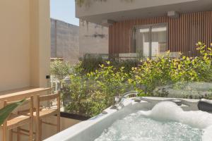 Fotografie z fotogalerie ubytování Living Stone Condo Hotel v Aténách