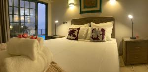 Postel nebo postele na pokoji v ubytování Suite 1 à Temanahau Lodge + 8 fotografií