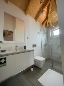 a bathroom with a sink and a toilet at Tides proprety - High tide in Paul do Mar