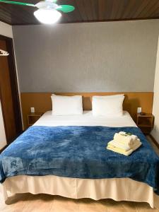Letto o letti in una camera di Pousada Bugio