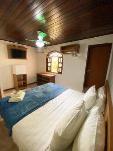 Letto o letti in una camera di Pousada Bugio