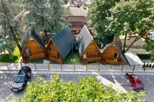 an overhead view of a group of wooden homes at Hotel Marina OASA in Grocka