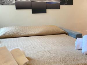 Cama o camas de una habitación en Beccaria Suite Firenze