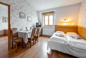 En eller flere senge i et værelse på Kazimierz Secret