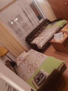 Кровать или кровати в номере Vila Elena