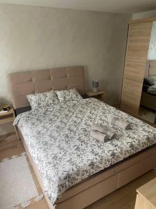 מיטה או מיטות בחדר ב-Apartman Milojevic