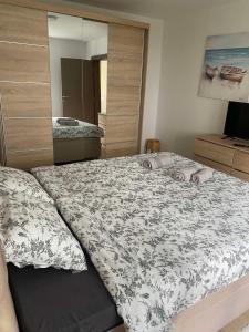 מיטה או מיטות בחדר ב-Apartman Milojevic