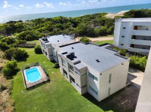 an aerial view of a house with a swimming pool at BRISA de MAR in Valeria del Mar