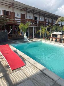 Πισίνα στο ή κοντά στο Posada Hostel La Piedra Mística