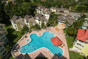 an aerial view of a swimming pool in a resort at Mystic Ridge Apt 2 Plus 6 in Ocho Rios