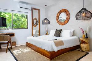 Postel nebo postele na pokoji v ubytování Terasu Riviera Maya Hotel & Spa, en Xcaret