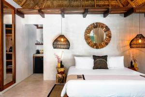 Postel nebo postele na pokoji v ubytování Terasu Riviera Maya Hotel & Spa, en Xcaret