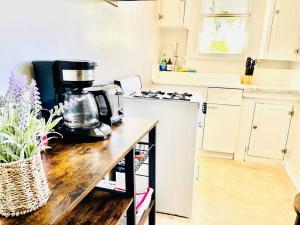 a kitchen with a counter with a coffee maker on it at Studio/ Downtown San Jose/Parking/laundry/SJSU in San Jose