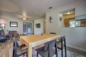 a dining room and living room with a table and chairs at Cute home w/ massage chair and wifi in Gainesville