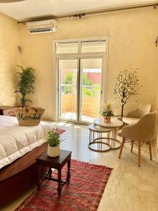 Posezení v ubytování Appartement Marrakech avec piscine privée