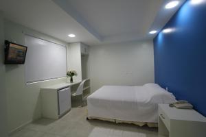 Postel nebo postele na pokoji v ubytování Hotel Don Zepe