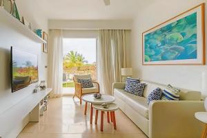 TV a/nebo společenská místnost v ubytování Cana Rock 108 Acceso Directo Piscina Punta Cana