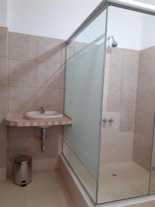 a bathroom with a shower and a sink at La Preferida in Lima