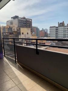 a balcony with a view of a city skyline at Urban Pulse in San Miguel de Tucumán
