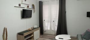 TV a/nebo společenská místnost v ubytování Appartement tout confort