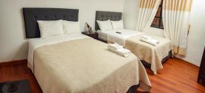 Katil atau katil-katil dalam bilik di HOTEL VALDELIRIOS