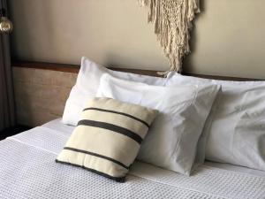 Postel nebo postele na pokoji v ubytování BAU Tulum