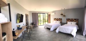 Voodi või voodid majutusasutuse Hotel Piedra Mulata - Adults Only toas