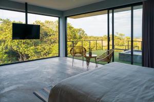 Voodi või voodid majutusasutuse Hotel Piedra Mulata - Adults Only toas