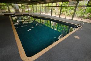 an overhead view of a swimming pool in a building at Sunraysia Resort Mildura in Mildura