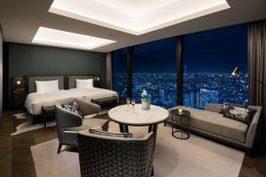 Postel nebo postele na pokoji v ubytování BELLUSTAR TOKYO, A Pan Pacific Hotel