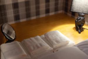 Кровать или кровати в номере SunPalace Nishi-Shinjuku