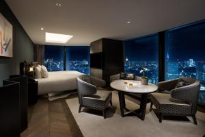 Postel nebo postele na pokoji v ubytování BELLUSTAR TOKYO, A Pan Pacific Hotel