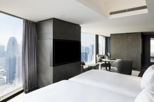 Postel nebo postele na pokoji v ubytování BELLUSTAR TOKYO, A Pan Pacific Hotel