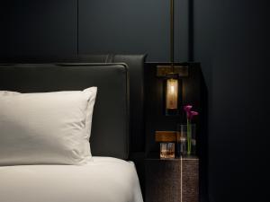 Postel nebo postele na pokoji v ubytování BELLUSTAR TOKYO, A Pan Pacific Hotel