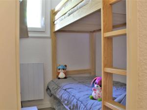 Двухъярусная кровать или двухъярусные кровати в номере Appartement Risoul, 1 pièce, 4 personnes - FR-1-330-567