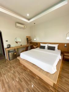 Postel nebo postele na pokoji v ubytování Dara Homestay