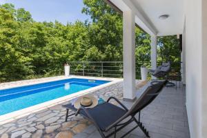Bazén v ubytování Holiday Home Rea nebo v jeho okolí