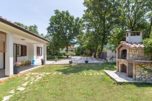 Zahrada ubytování Holiday Home Rea