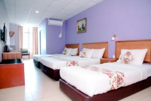Katil atau katil-katil dalam bilik di HOTEL D VIEW MERSING