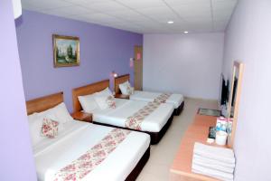 Katil atau katil-katil dalam bilik di HOTEL D VIEW MERSING