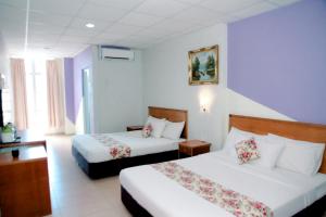 Katil atau katil-katil dalam bilik di HOTEL D VIEW MERSING