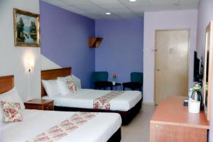 Katil atau katil-katil dalam bilik di HOTEL D VIEW MERSING