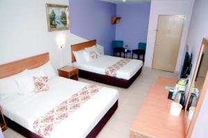 Katil atau katil-katil dalam bilik di HOTEL D VIEW MERSING