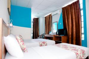 Katil atau katil-katil dalam bilik di HOTEL D VIEW MERSING