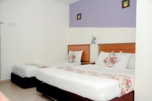 Katil atau katil-katil dalam bilik di HOTEL D VIEW MERSING