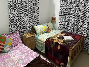 Postel nebo postele na pokoji v ubytování Coorg Dream Land Homestay by StayApart, Kushalnagar