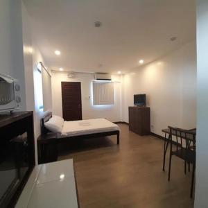 TV a/nebo společenská místnost v ubytování Palawan-Residence B&B