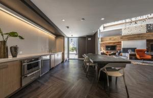 a kitchen with a table and a dining room at Milpitas 1BR w Pool Gym WD nr BART SFO-747 in Milpitas
