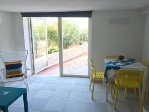Balkón nebo terasa v ubytování Casetta in Riva al Mare